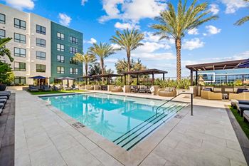 Resort-style pool with private cabanas